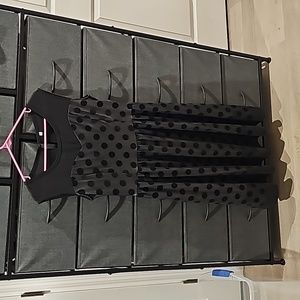 Sleeveless black polka dot dress